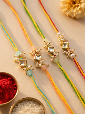 KARATCART Set of 4 Pastel Pearl Beads Square Polki Kundan Rakhi for Brother with Roli & Chawal