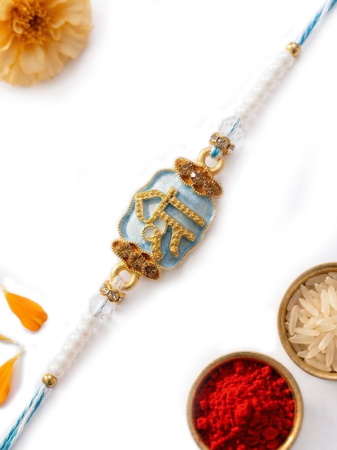 KARATCART Gold Plated Light Blue Meenakari Shree Radha Rani Bhaiya Rakhi with Roli & Chawal