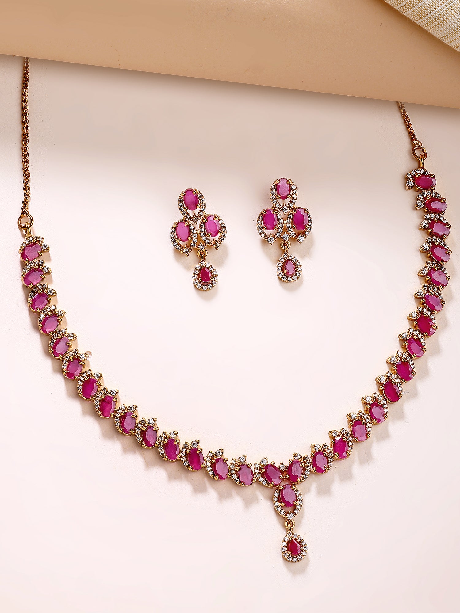 KARATCART Elegant Gold-Plated Red Oval American Diamond Jewellery Set for Women