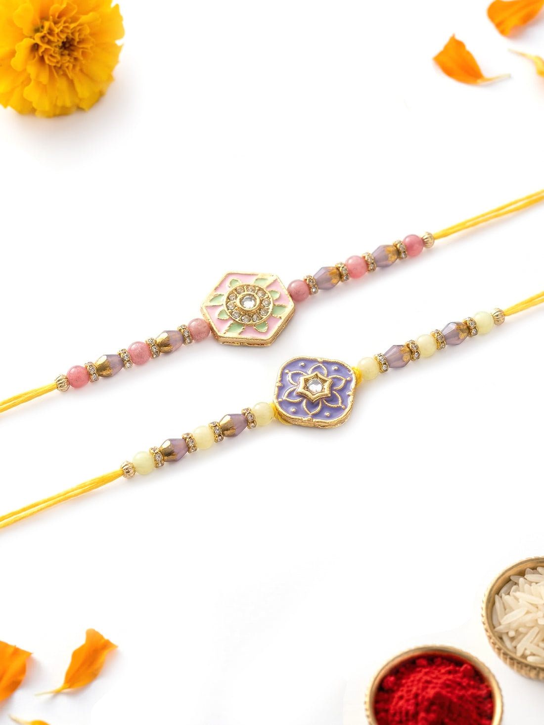 KARATCART Set of 2 Pink and Purple Floral Enamel Rakhi for Brother with Roli & Chawal