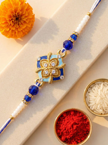 KARATCART Gold Plated Royal Blue Meenakari Flower Designer Bhaiya Rakhi with Roli & Chawal