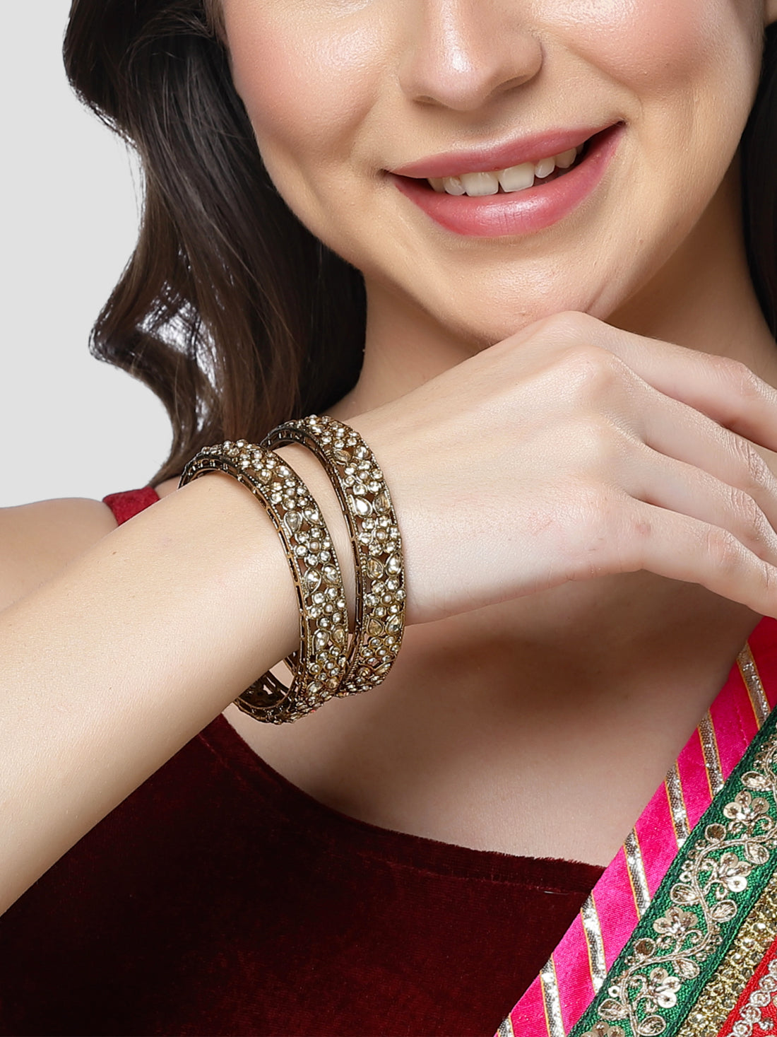 Karatcart Set of 2 Kundan Studded Floral Design Antique Gold Plated Bangles for Women