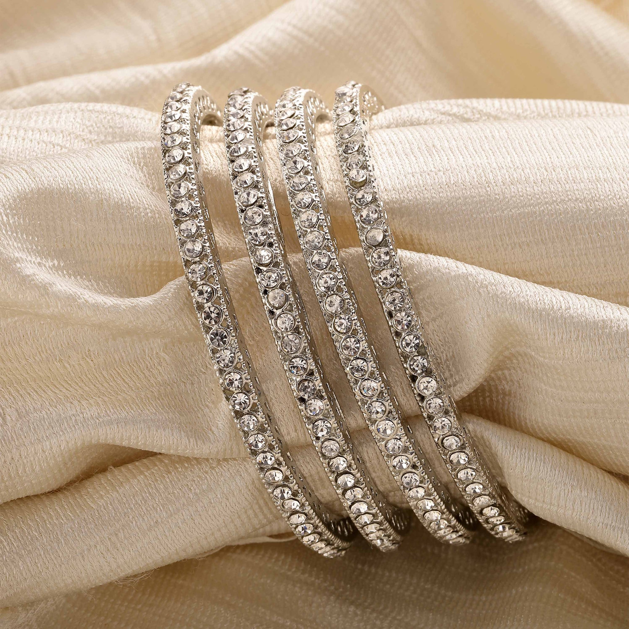 Karatcart Set of 4 American Diamond Studded Silver Plated Bangles for Women