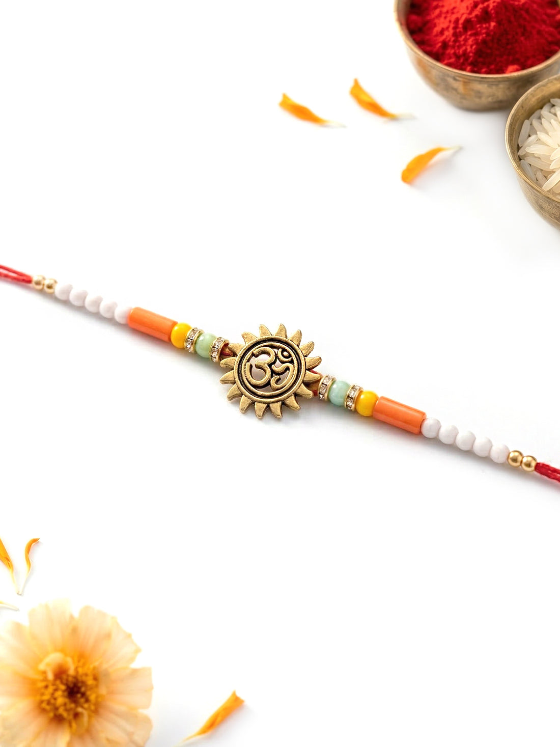 KARATCART Gold Plated Om Sun Design Beaded Bhaiya Rakhi with Roli & Chawal