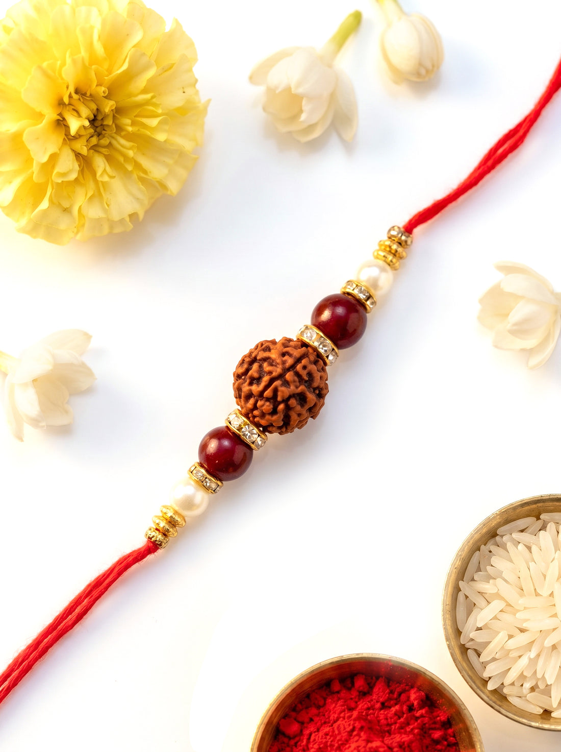 KARATCART Gold Plated Rudraksha Studded Designer Bhaiya Rakhi with Roli & Chawal