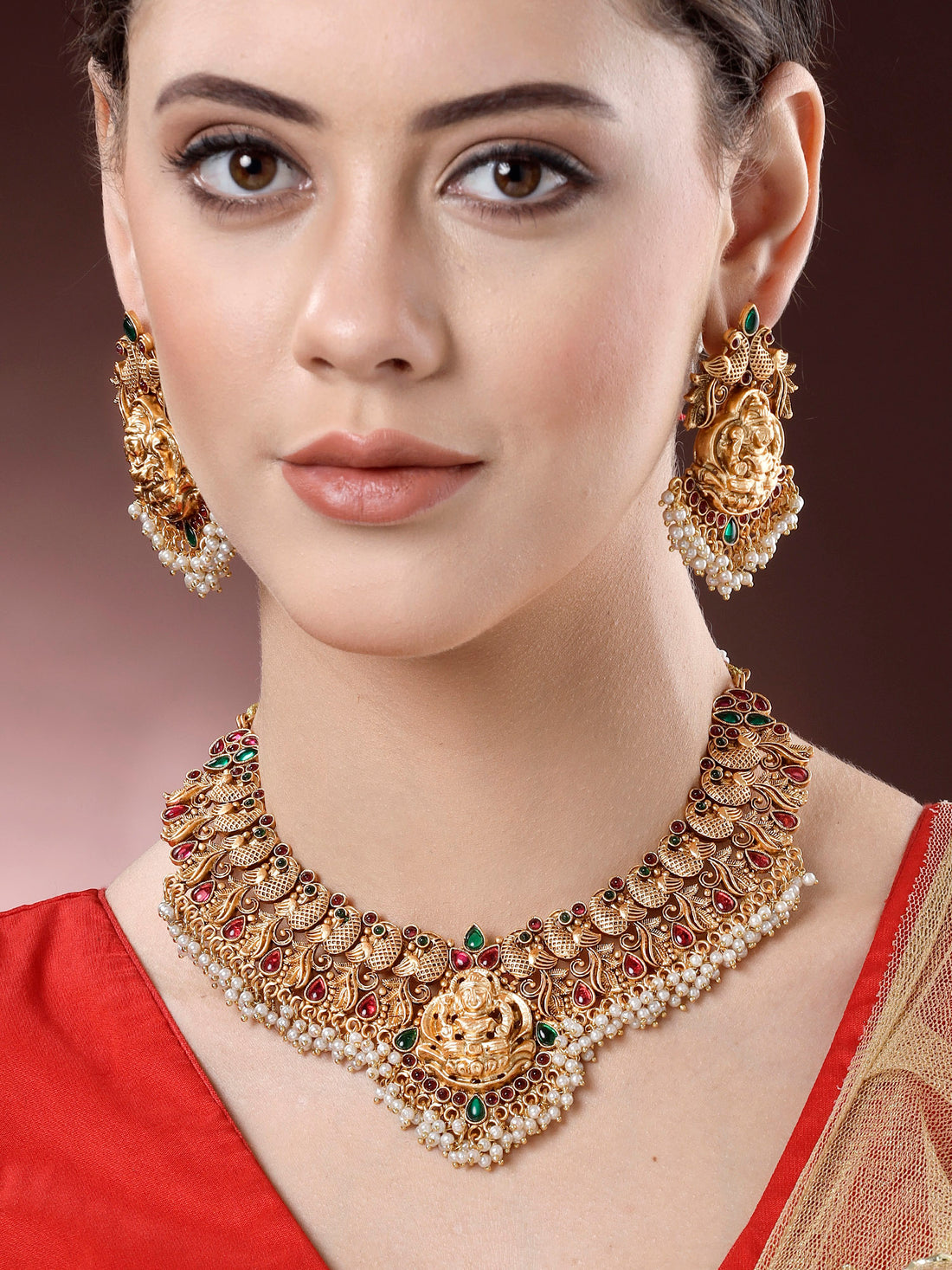 Karatcart Gold Plated Red and Green Stone Laxmi Mata Temple Jewellery Set for Women