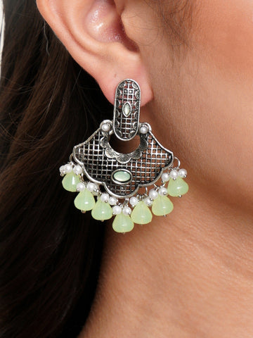 Karatcart Oxidised Silver Light Green Monalisa Stone and Pearl Studded Dangler Earrings for Women