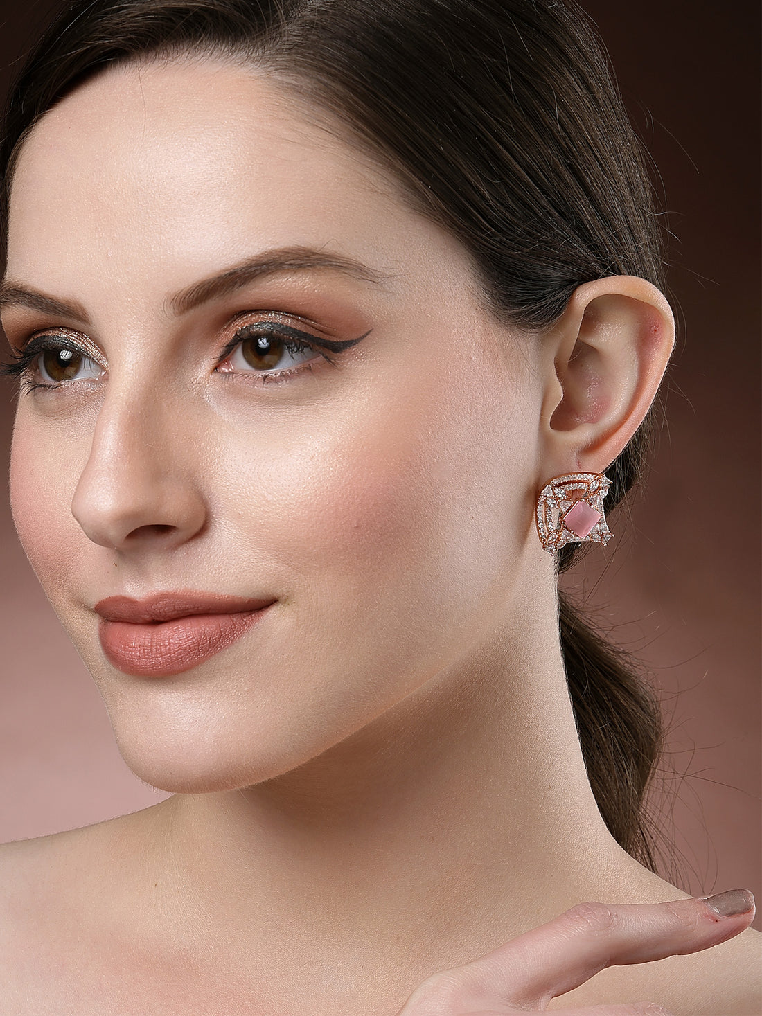 Karatcart Rose Gold Plated Pink Stones AD Stud Earrings for Women