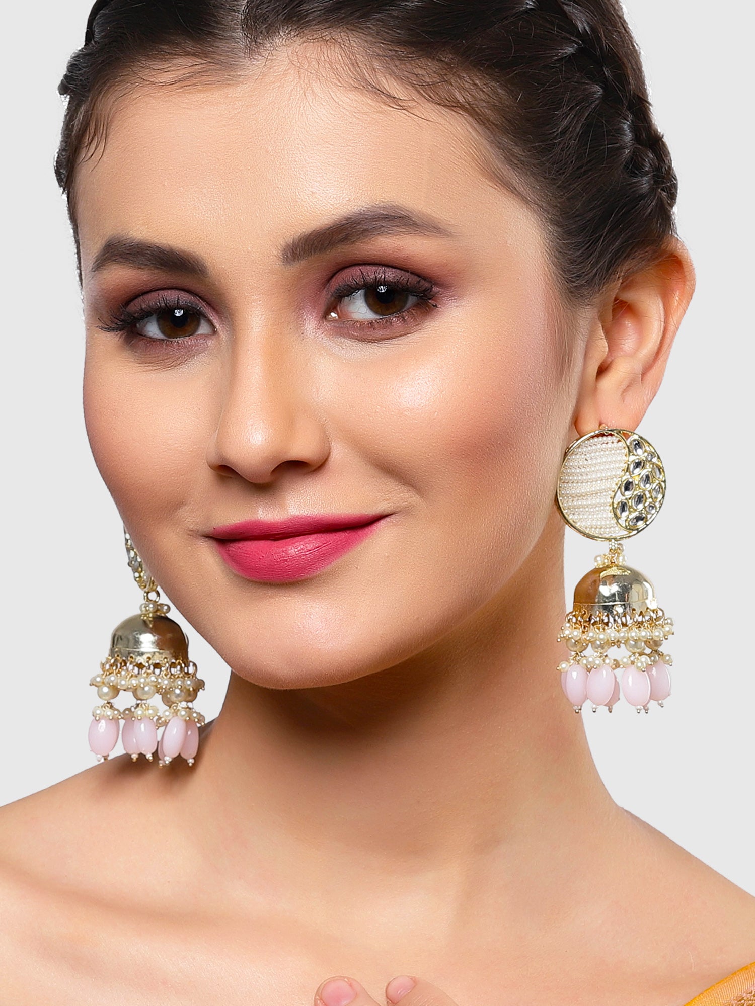 Karatcart Gold Plated Pink Tumble and Pearl Studded Kundan Jhumki Earrings for Women - view 2