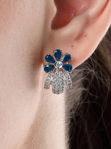 Karatcart Silver Plated Blue Stones Floral Design AD Stud Earrings for Women