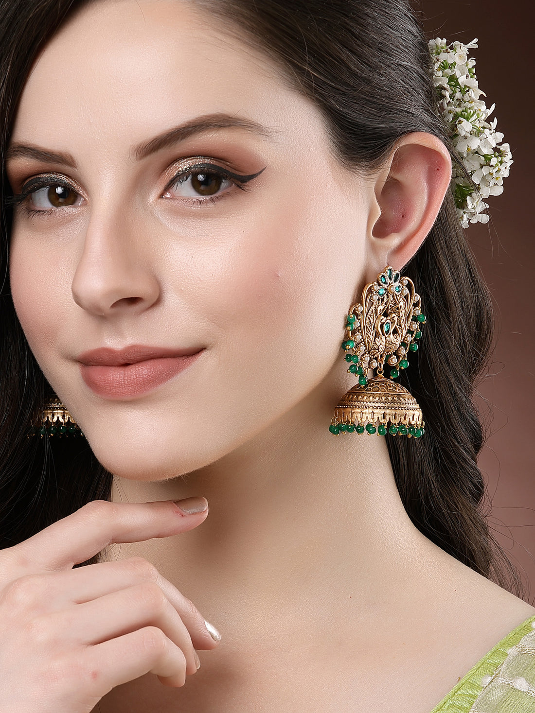 Karatcart Peacock Design Gold Plated Green Beads Jhumki Earrings for Women