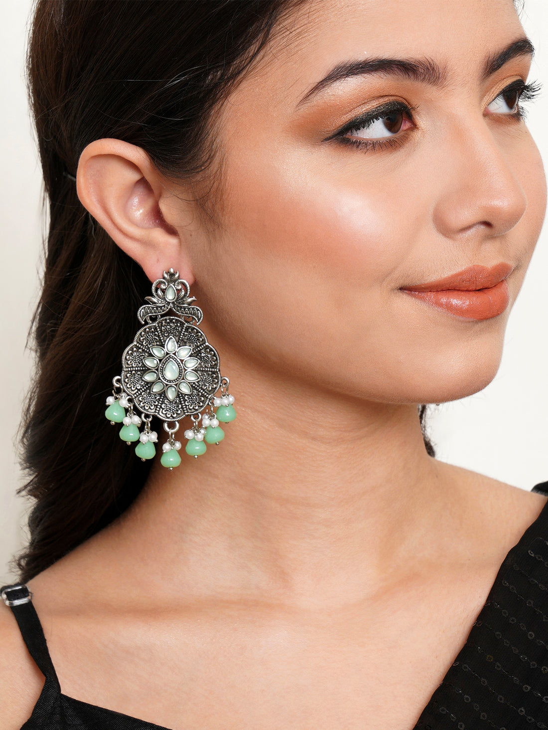 Karatcart Oxidised Silver Light Green Monalisa Stone Studded Floral Dangler Earrings for Women