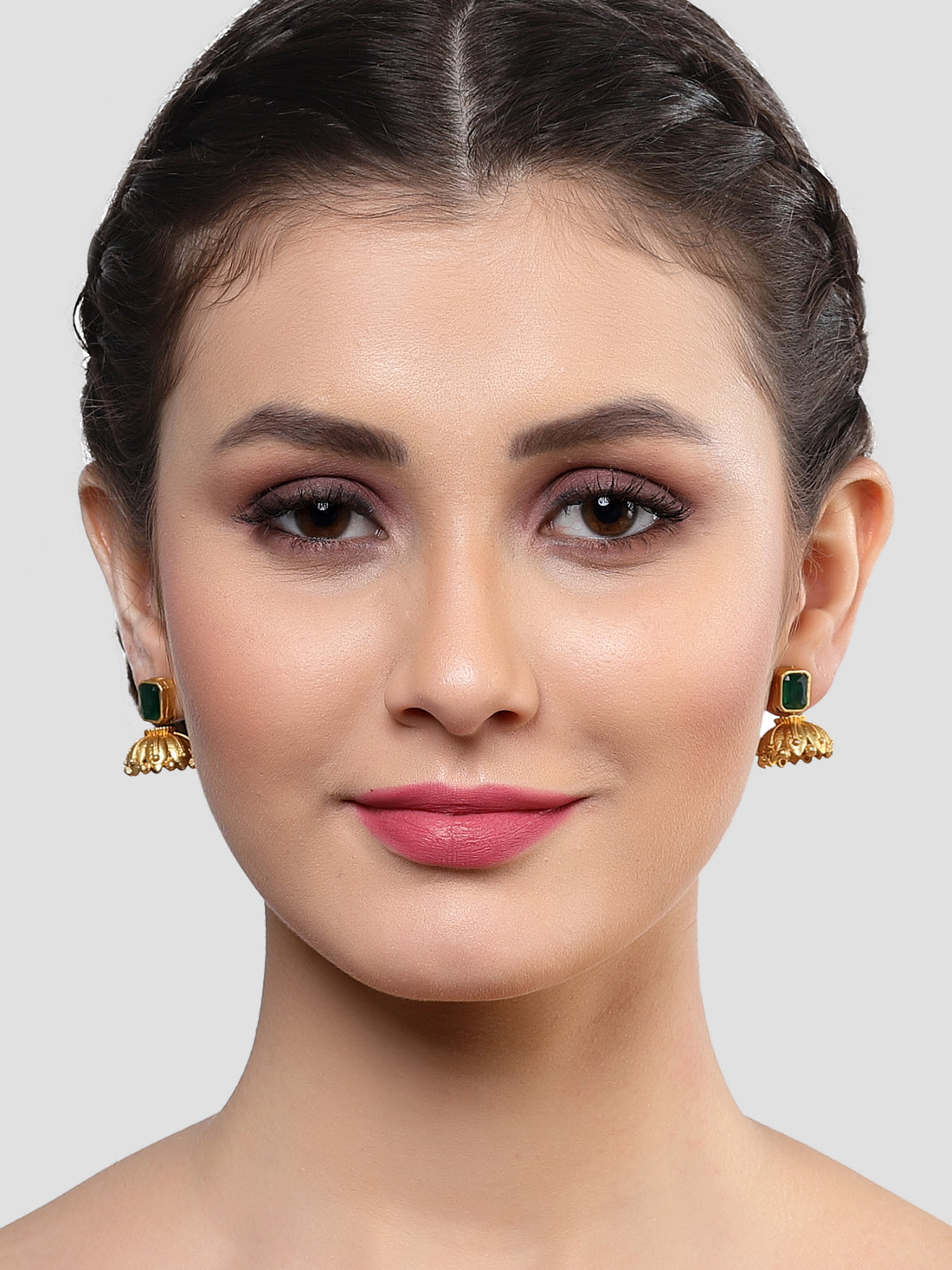 Karatcart Gold Plated Green Stone Studded Leaf Shape Jhumki Earrings for Women