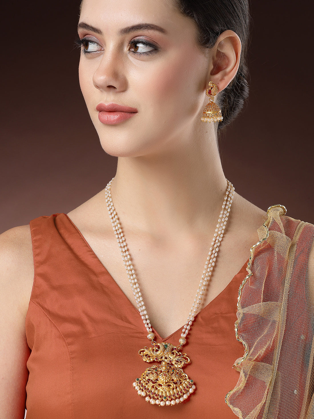 Karatcart Gold Plated Pearl Studded Peacock Design Temple Jewellery Set for Women