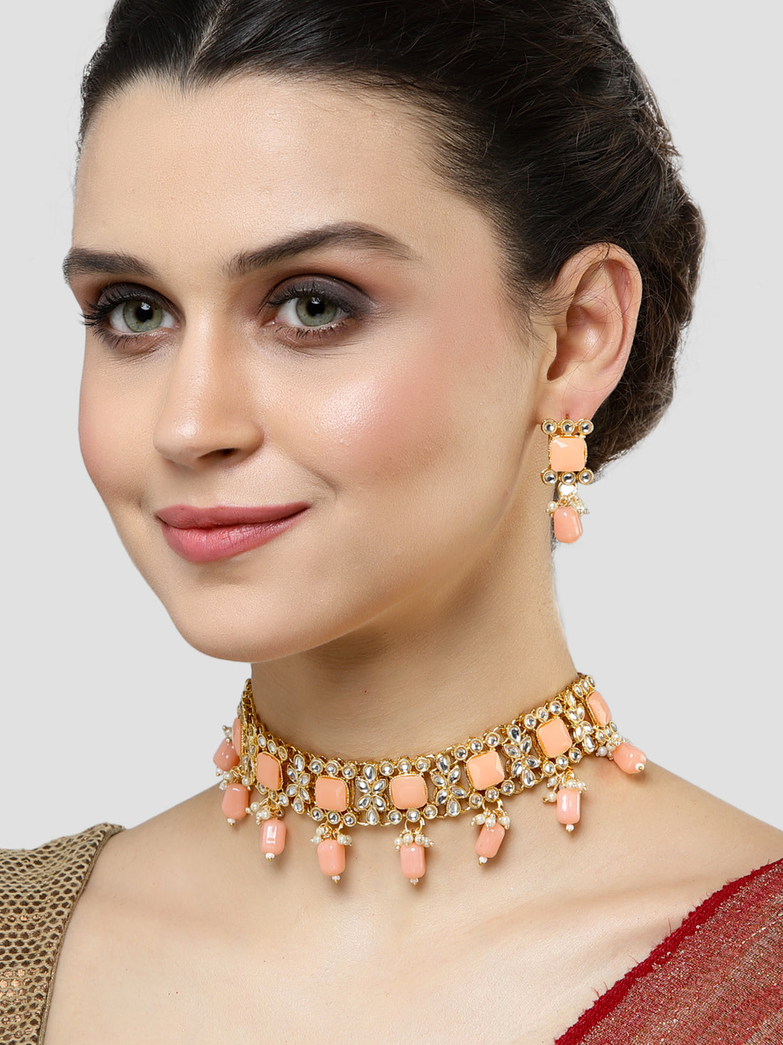 Karatcart Gold Plated Peach Tumble Kundan Necklace Set