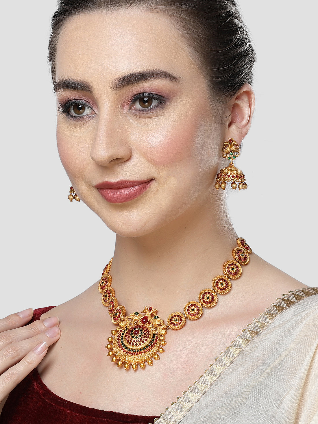 Karatcart Red and Green Stones Studded Temple Jewellery Set for Women