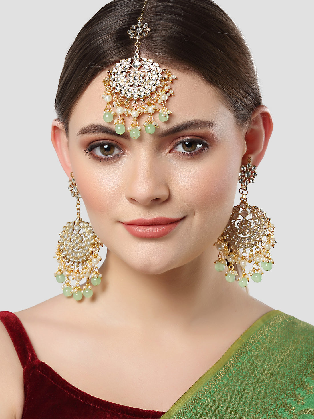 Karatcart Gold Plated Light Green Beads and Pearl Studded Kundan Chandbali Earrings for Women