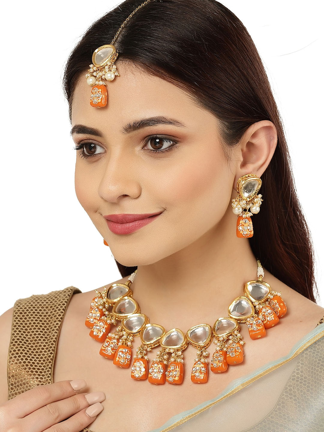 Gold-Plated Orange & White Polki Kundan-Studded & Pearl Beaded Handcrafted Jewellery Set