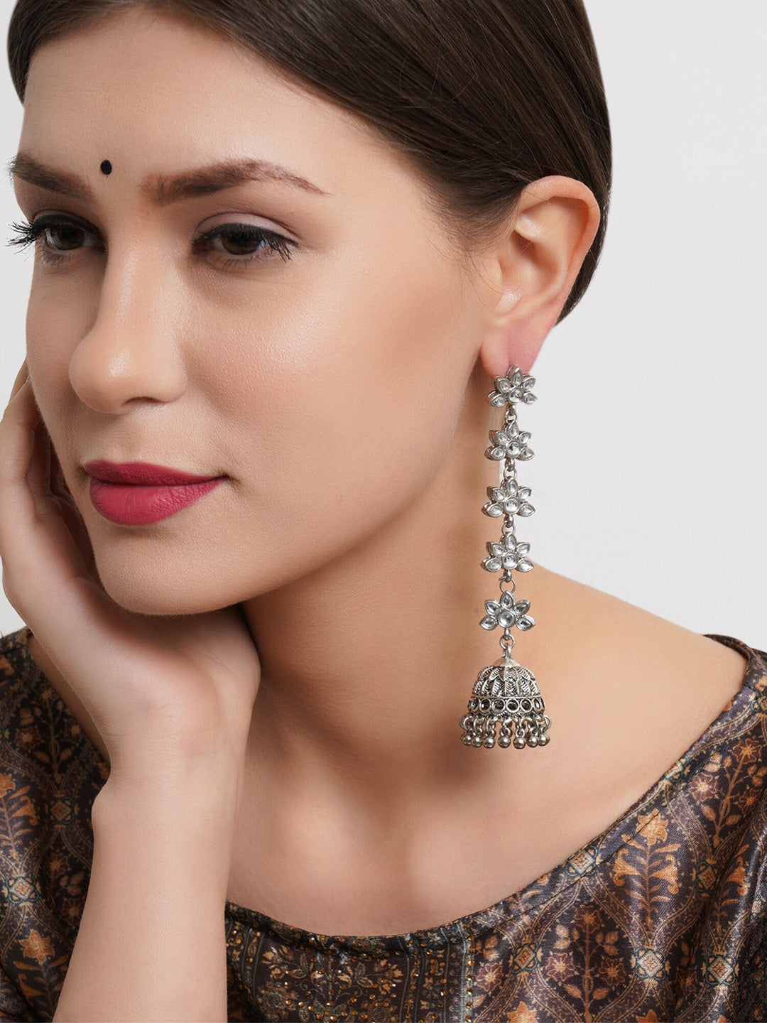 Silver-Toned Floral Kundan Studded Jhumkas Earrings