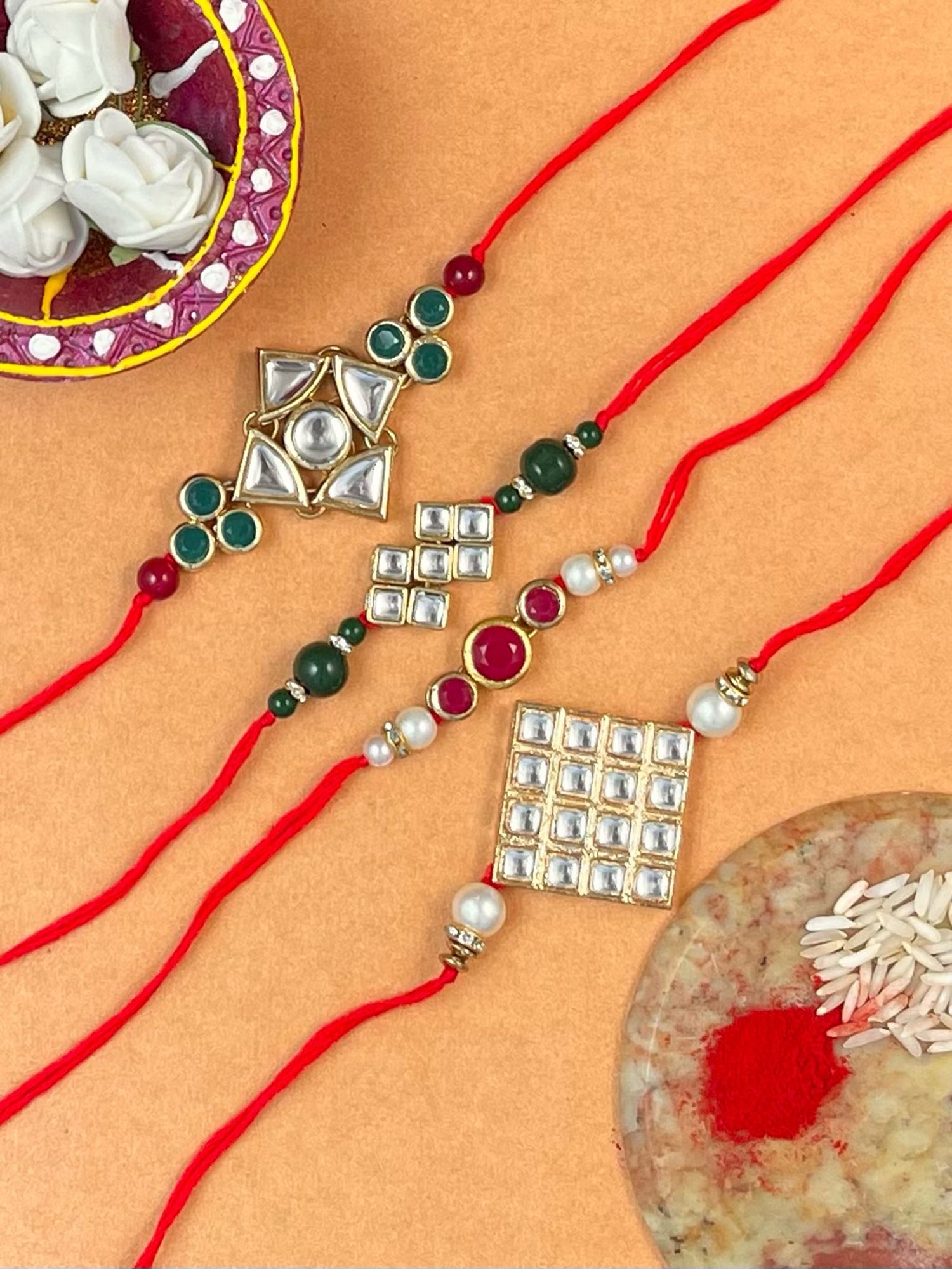 Set of 4 Gold Plated Kundan Rakhi For Brother.