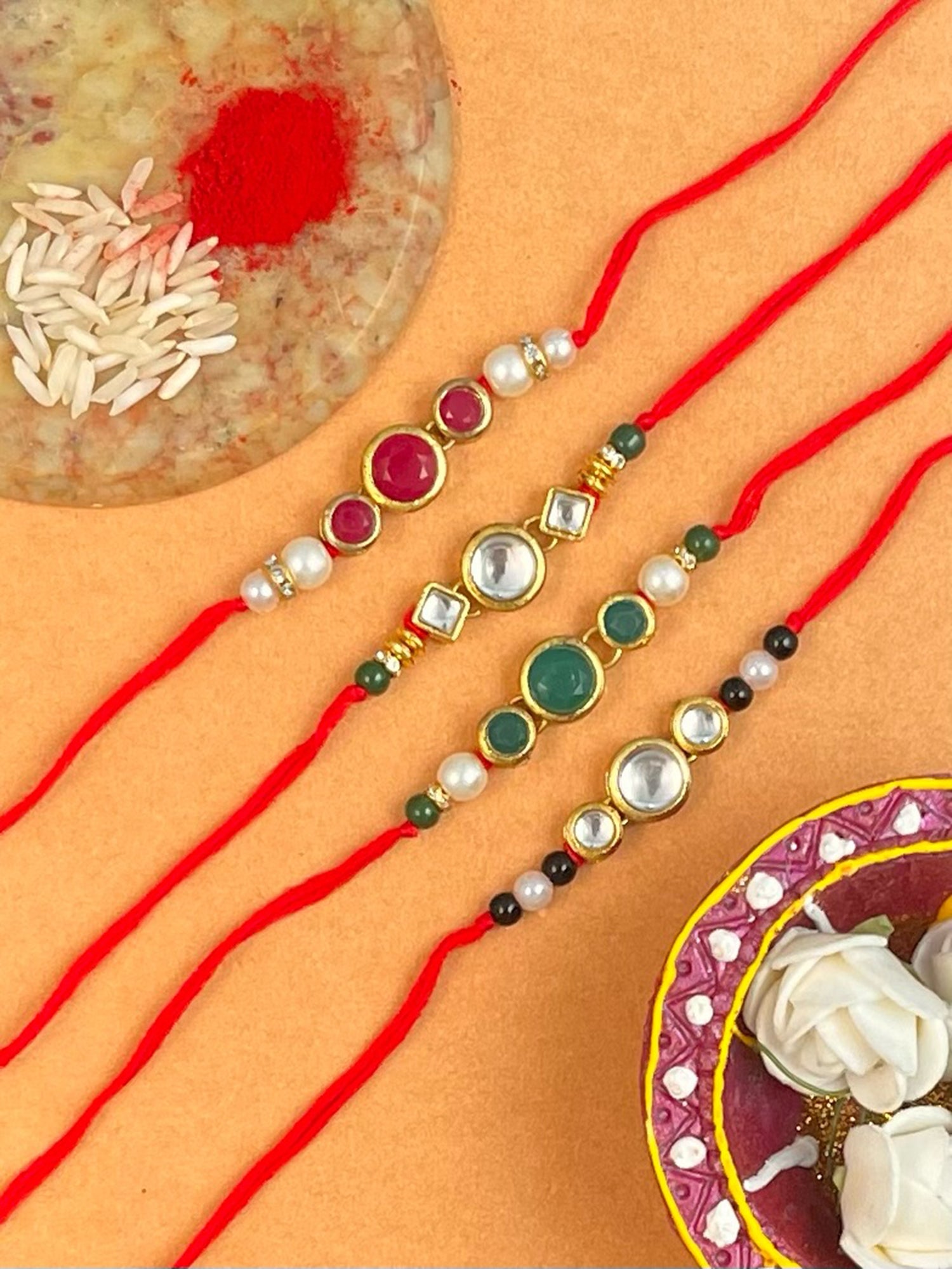Set of 4 Gold Plated Kundan Rakhi For Brother.