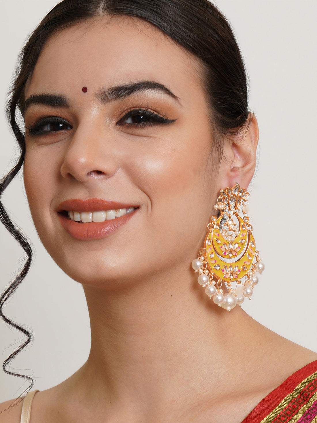 Karatcart Gold Plated Yellow Meena Lotus Design Pearl Studded Chandbali Earrings for Women