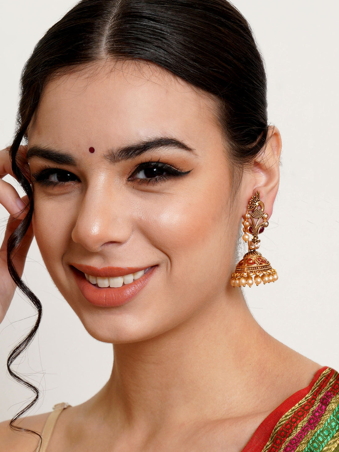 Karatcart Gold Plated Maroon Stone Studded Peacock Shape Jhumki Earrings for Women